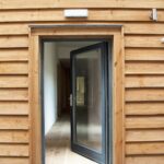 ULTRA triple glazed timber entrance door at PYC Group Passivhaus Office Welshpool