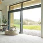 triple glazed timber lift and slide doors at low energy selfbuild project Yorkshire
