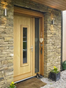 ULTRA triple glazed timber oak entrance door at low energy selfbuild project Yorkshire
